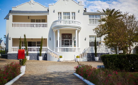 Herberg Manor Entrance of 1920's house Double storey white house Converted convent