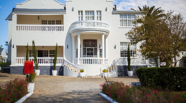 Herberg Manor Entrance of 1920's house Double storey white house Converted convent