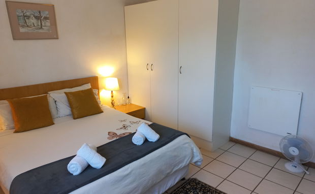 Queen bed, BIC, heater & fan