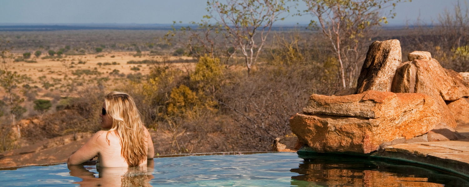 Woman on safari with Gonana South African Travel