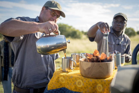 Ranger makes coffee during big five morning game drive Thornybush Game Reserve