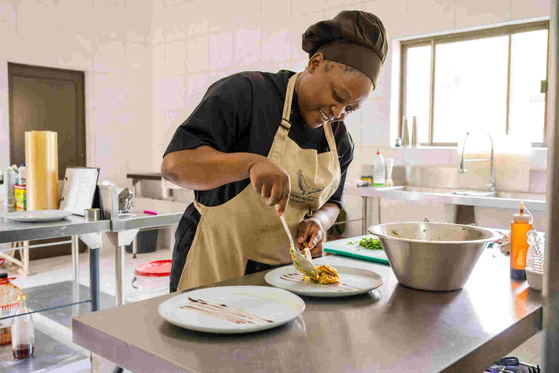 Gift is a masterchef at her craft in the kitchen, Shimungwe Lodge, Greater Kruger Park Gift is a masterchef at her craft in the kitchen, Shimungwe Lodge, Greater Kruger Park