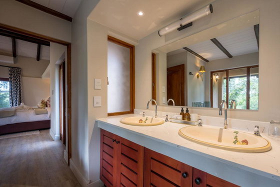 Double basin of luxury safari lodge bathroom. Shimungwe. Greater Kruger.