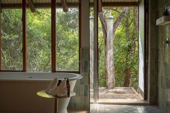 Invigorating outdoor shower. Luxury safari lodge Greater Kruger Invigorating outdoor shower. Luxury safari lodge Greater Kruger