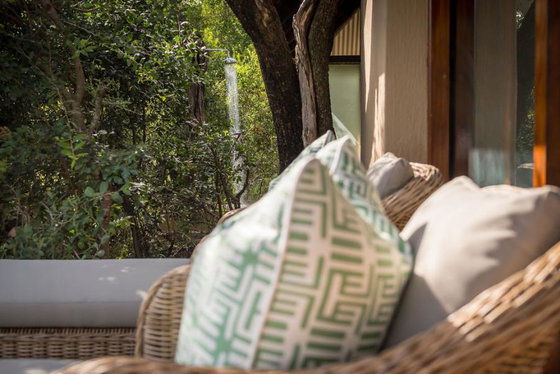 Comfortable sun loungers on private guest suite decks. Luxury safari Greater Kruger