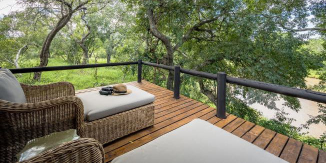 Private deck overlooking the riverbed. Luxury safari lodge Greater Kruger