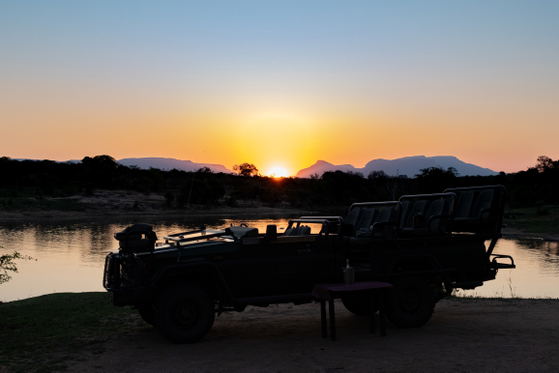 Open air game drive vehicles for exploring wildlife on game drives in Thornybush Game Reserve, Greater Kruger Open air game drive vehicles for exploring wildlife on game drives in Thornybush Game Reserve, Greater Kruger