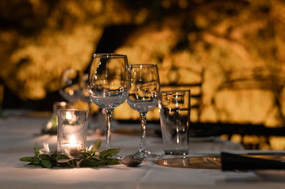 Dinner setting with wine glasses ready at Shimungwe Lodge, Thornybush Game Reserve, Greater Kruger Dinner setting with wine glasses ready at Shimungwe Lodge, Thornybush Game Reserve, Greater Kruger