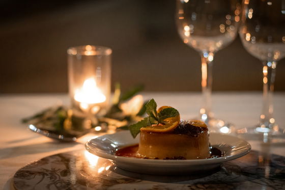 Home made gourmet pudding with candles at Shimungwe Lodge, Thornybush Game Reserve, Greater Kruger Home made gourmet pudding with candles at Shimungwe Lodge, Thornybush Game Reserve, Greater Kruger