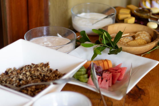 Muesli, yoghurt and fruit at breakfast, Shimungwe Lodge, Thornybush Game Reserve, Greater Kruger Muesli, yoghurt and fruit at breakfast, Shimungwe Lodge, Thornybush Game Reserve, Greater Kruger