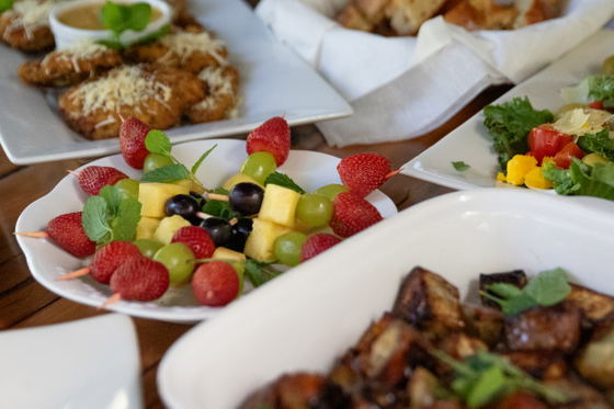 Fruit kebabs and other delicious food ready for high tea at Shimungwe Lodge, Thornybush Game Reserve, Greater Kruger Fruit kebabs and other delicious food ready for high tea at Shimungwe Lodge, Thornybush Game Reserve, Greater Kruger