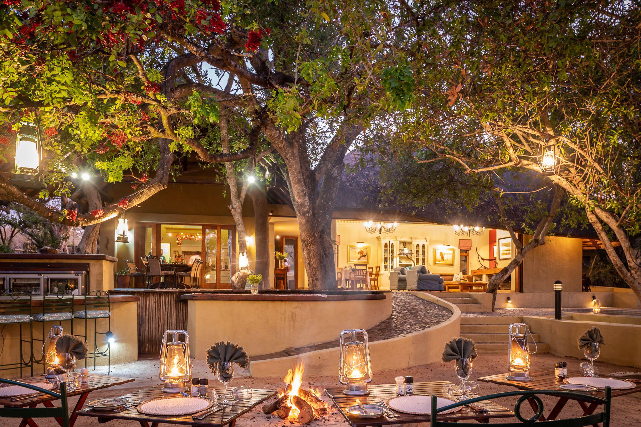 open lounge and dining area for outdoor living on safari in South Africa