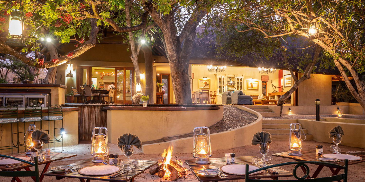 open lounge and dining area for outdoor living on safari in South Africa