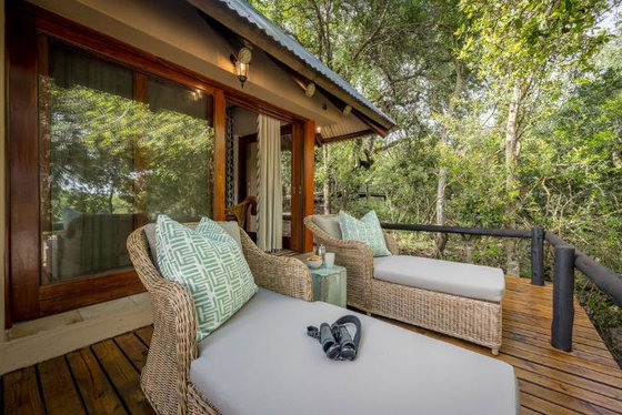 Private guest deck nestled under the trees. Luxury safari lodge Greater Kruger