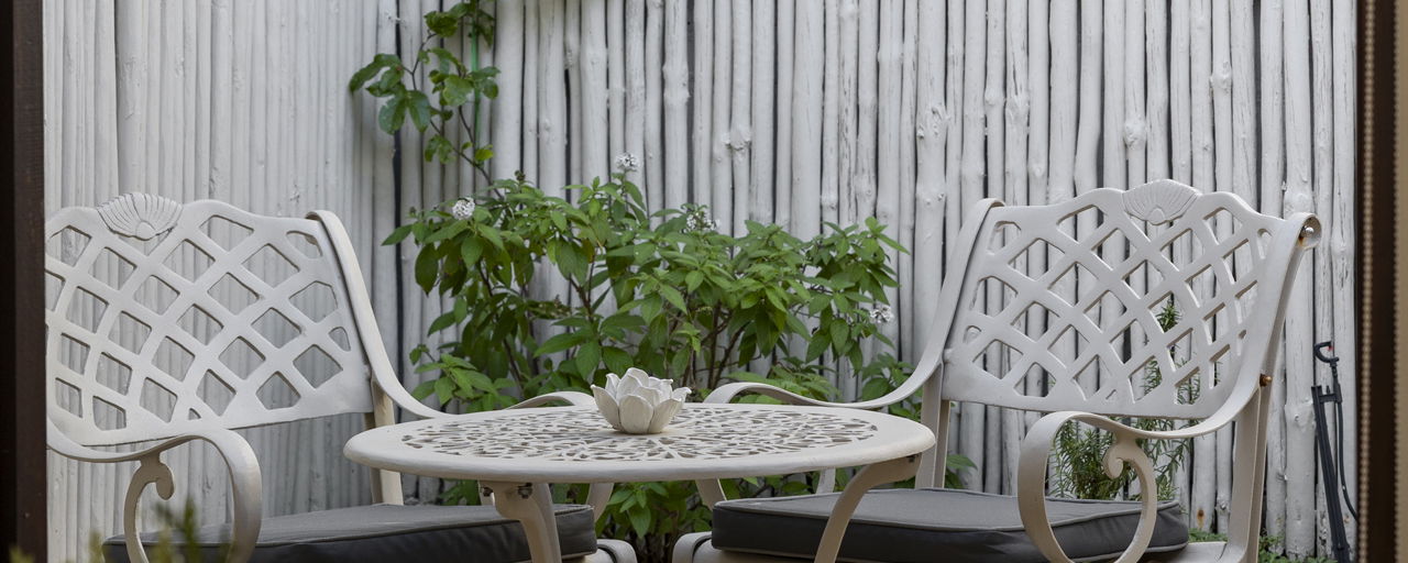 Relax on your private patio in our elegant Deluxe Room