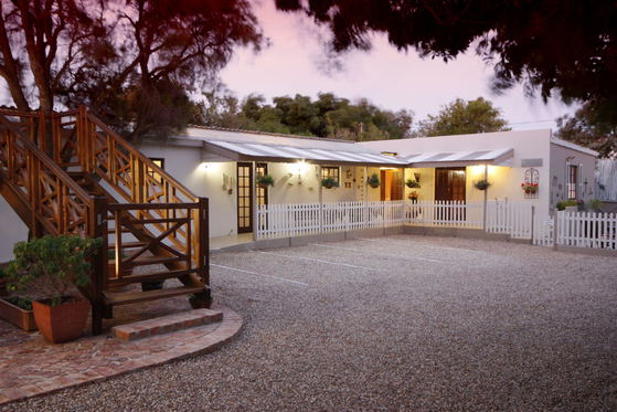 Parking in private courtyard. Staircase is private entrance to Studio Room