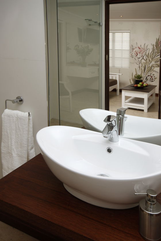 En-suite bathroom with walk in shower.