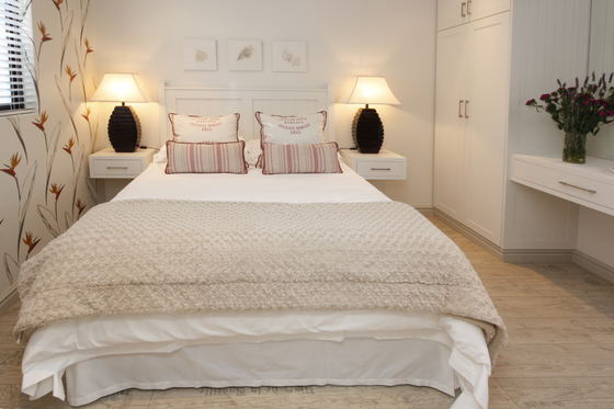 Standard Room with en-suite shower, DSTV, WIFI, tea/coffee making facilities, wall heater, ceiling fan, hot water bottles, safety deposit box, luggage rack, artistic hand painted walls. Standard Room with en-suite shower, DSTV, WIFI, tea/coffee making facilities, wall heater, ceiling fan, hot water bottles, safety deposit box, luggage rack, artistic hand painted walls.