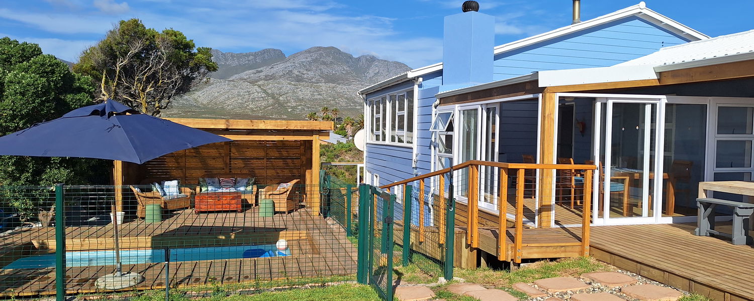 Wind sheltered beach house with pool
