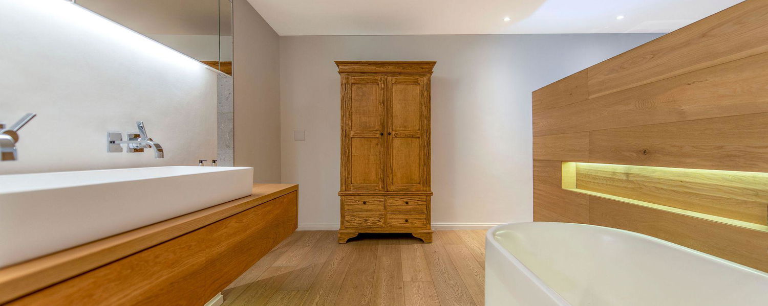bathroom with bathtub and shower