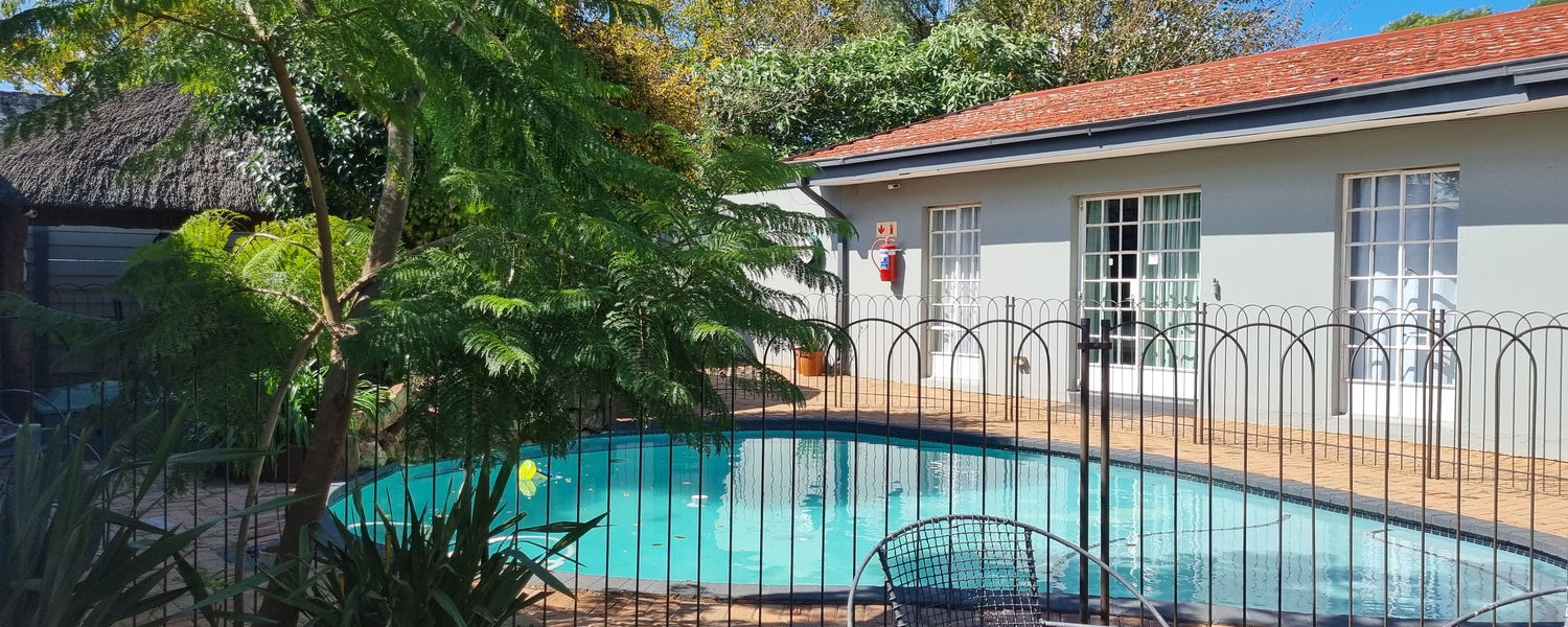 Secluded pool and small entertainment area