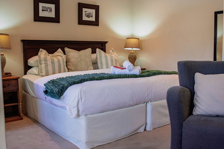 Double-bed room with Brown and Teal Color Scheme, Hermanus Cliff Path Lodge, Beachfront Lodge, DCC Hotel Group