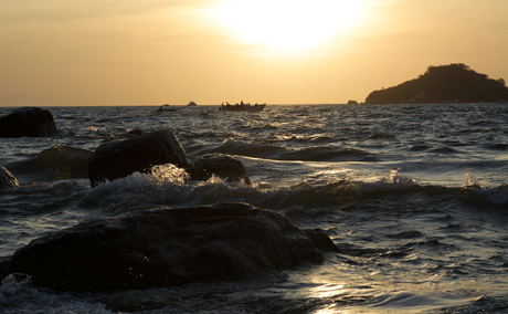 Fishermen early in the morning in senga bay on lake malawi Fishermen early in the morning in senga bay on lake malawi