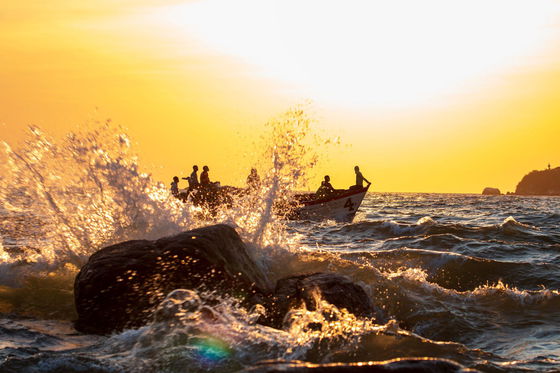 Fishermen early in the morning in senga bay malawi