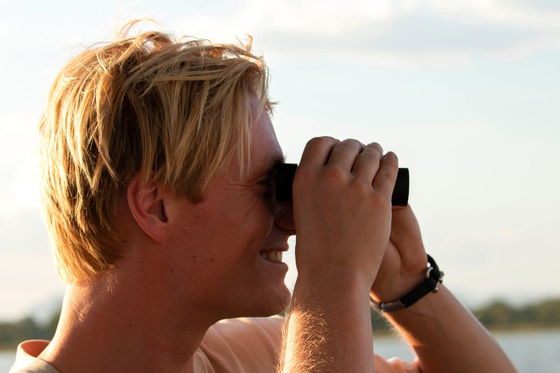 Tourist watching birds