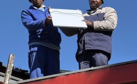 Putting up Starlink at Malealea Lodge