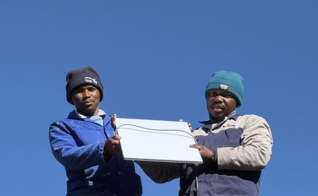 Putting up Starlink at Malealea Lodge