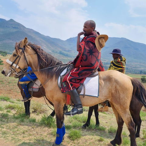 Nkhabane wearing a Basotho Blanket on his horse