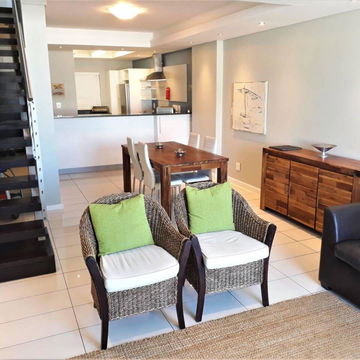 Our rooms blend a modern aesthetic with earthy tones, creating a vibrant and inviting atmosphere that enhances your stay at Hermanus Luxury Accommodation by The DCC Hotel Group.
