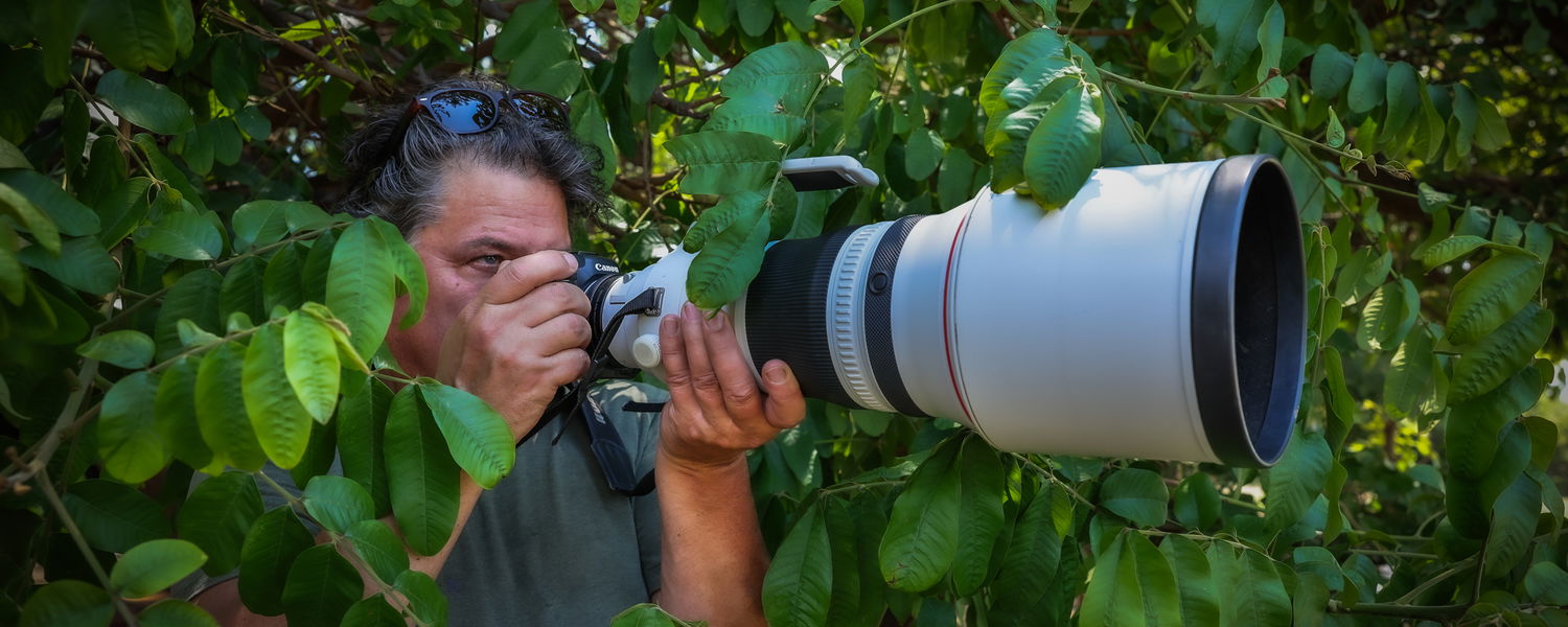 Floris Leeuwenburg making photo of Leopard