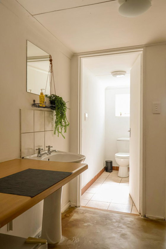 Spacious ensuite bathroom with modern facilities for a comfortable and convenient stay.
