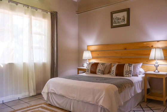 Comfortable guest bedroom designed for overnight stays, holidays and longer visits near Hoedspruit.