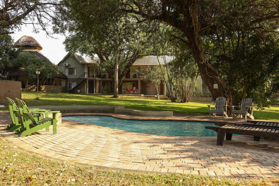 Swimming pool and peaceful gardens at our comfortable accommodation near Kruger National Park and Hoedspruit.
