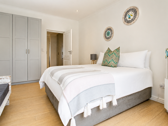 Second bedroom with queen bed at Elevate Grotto Bay