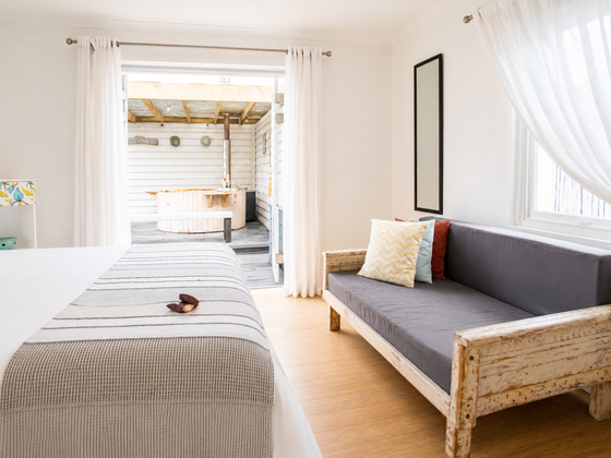 Second bedroom with a view of the private hot tub