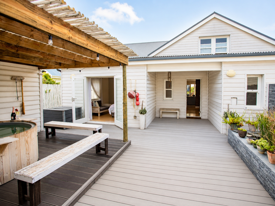 Front entrance and private courtyard hot tub at Elevate Grotto Bay