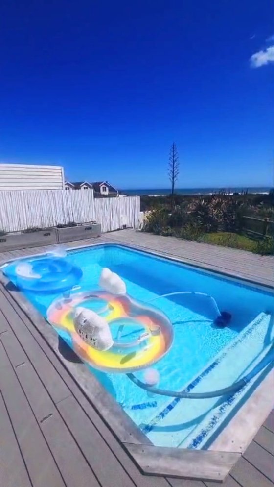 Pool floaties with sea view