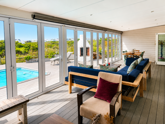 Veranda with glass doors closed, overlooking the garden