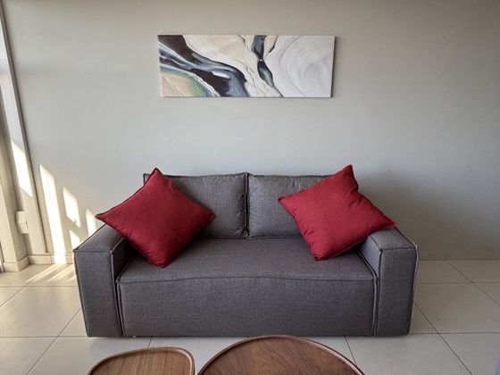 Sofa bed in the living room at Glenhazel Square