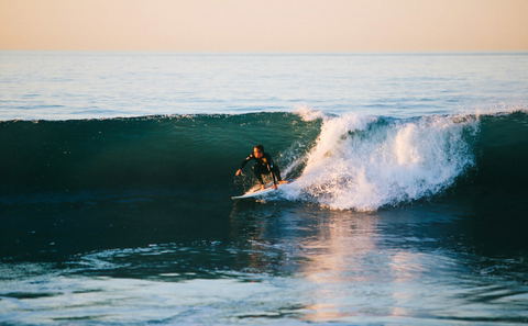 A surfer riding a wave