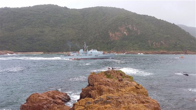 The Navy Minesweeper entering the Heads during the 2015 Oyster Festival