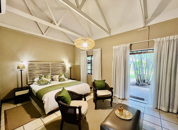 Spacious Double or Twin Garden rooms overlooking the lush central garden courtyard and pool area