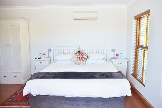 King bed, white linen, spacious room, air-conditioning, wi-fi, nespresso