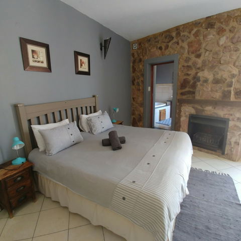 Blue Sky Lodge - Middle west bedroom with private fireplace