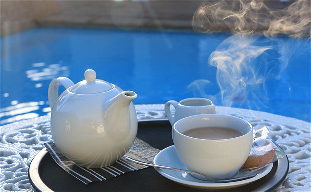 Tea by the swimming pool at Paradiso Guest House in Constantia, Cape Town Tea by the swimming pool at Paradiso Guest House in Constantia, Cape Town
