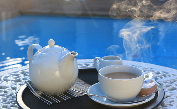 Tea by the swimming pool at Paradiso Guest House in Constantia, Cape Town Tea by the swimming pool at Paradiso Guest House in Constantia, Cape Town